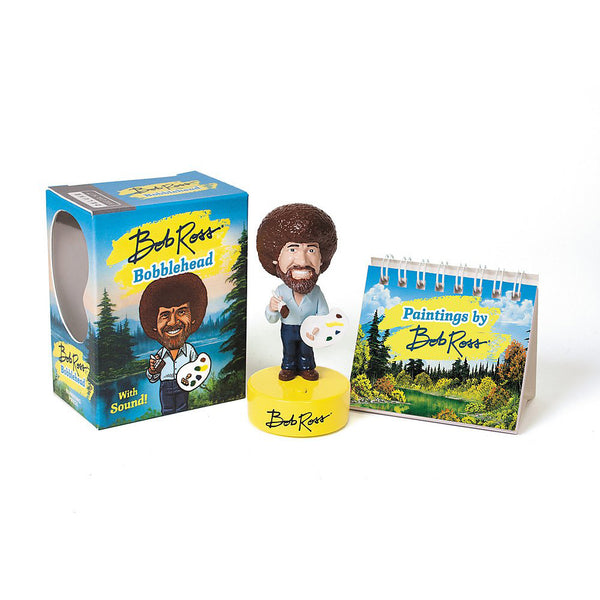 Bob Ross' happy paintings, memorable hairstyle and quirky catchphrases make us grin from ear to ear. This kit includes a Bob Ross bobblehead figure that plays ten different wise and witty sayings from the art master. Also included is a mini easel book featuring Ross' landscape works, which can be displayed alongside the bobblehead figure.