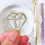 Gold Diamond Paper Clips. Use to embellish crafts or as a functional supply. Use as an accent on paper edges, attach vellum overlays by clipping at corners or simply use as a paper clip.