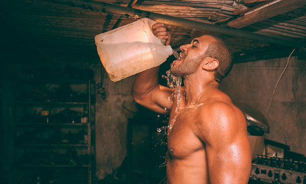 Strong Man Drinking Gallon Of Water