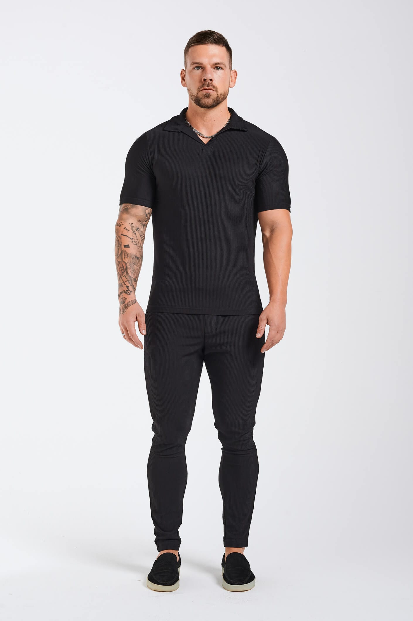 PLEATED POLO - BLACK