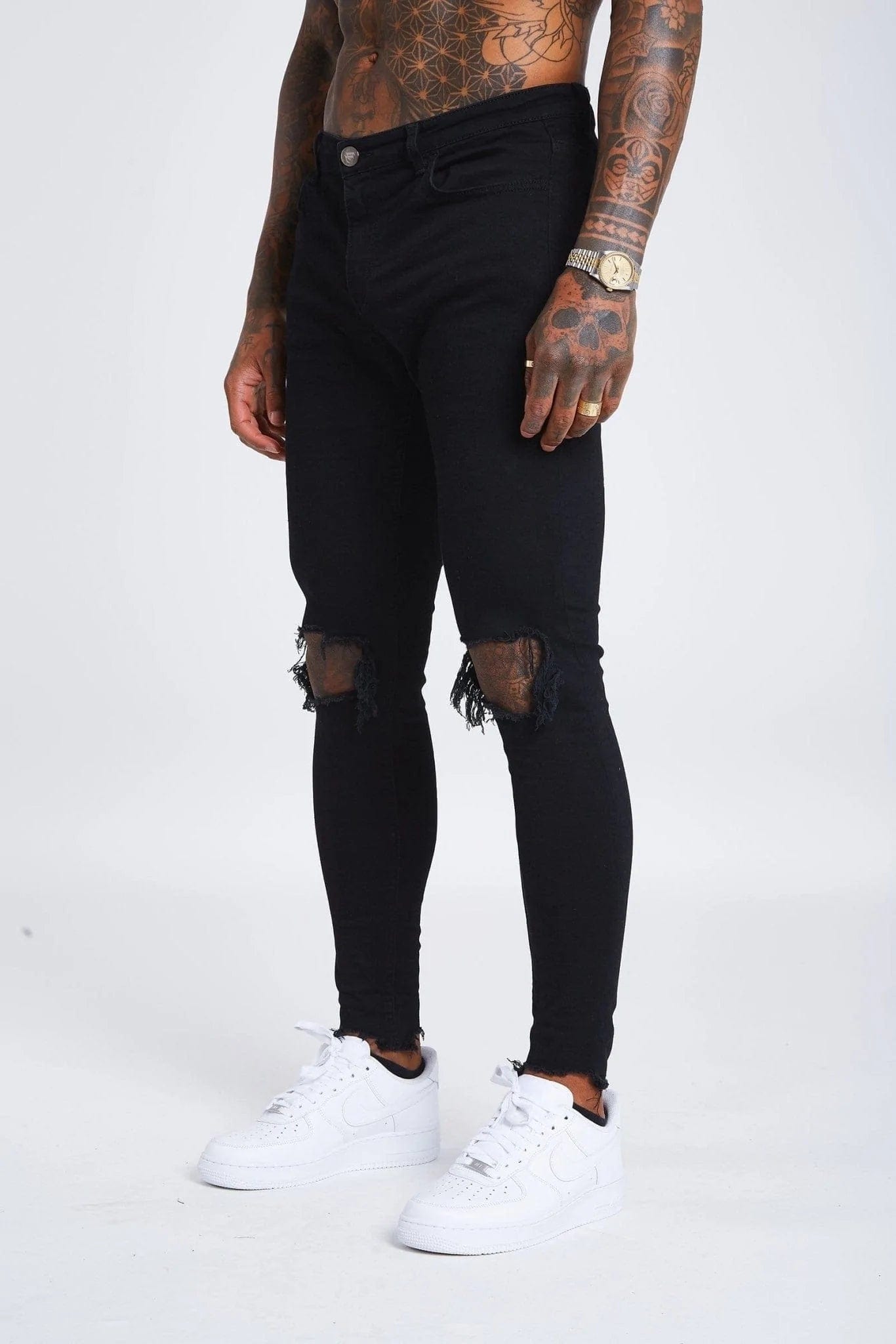 BLACK DESTROYED KNEE JEANS