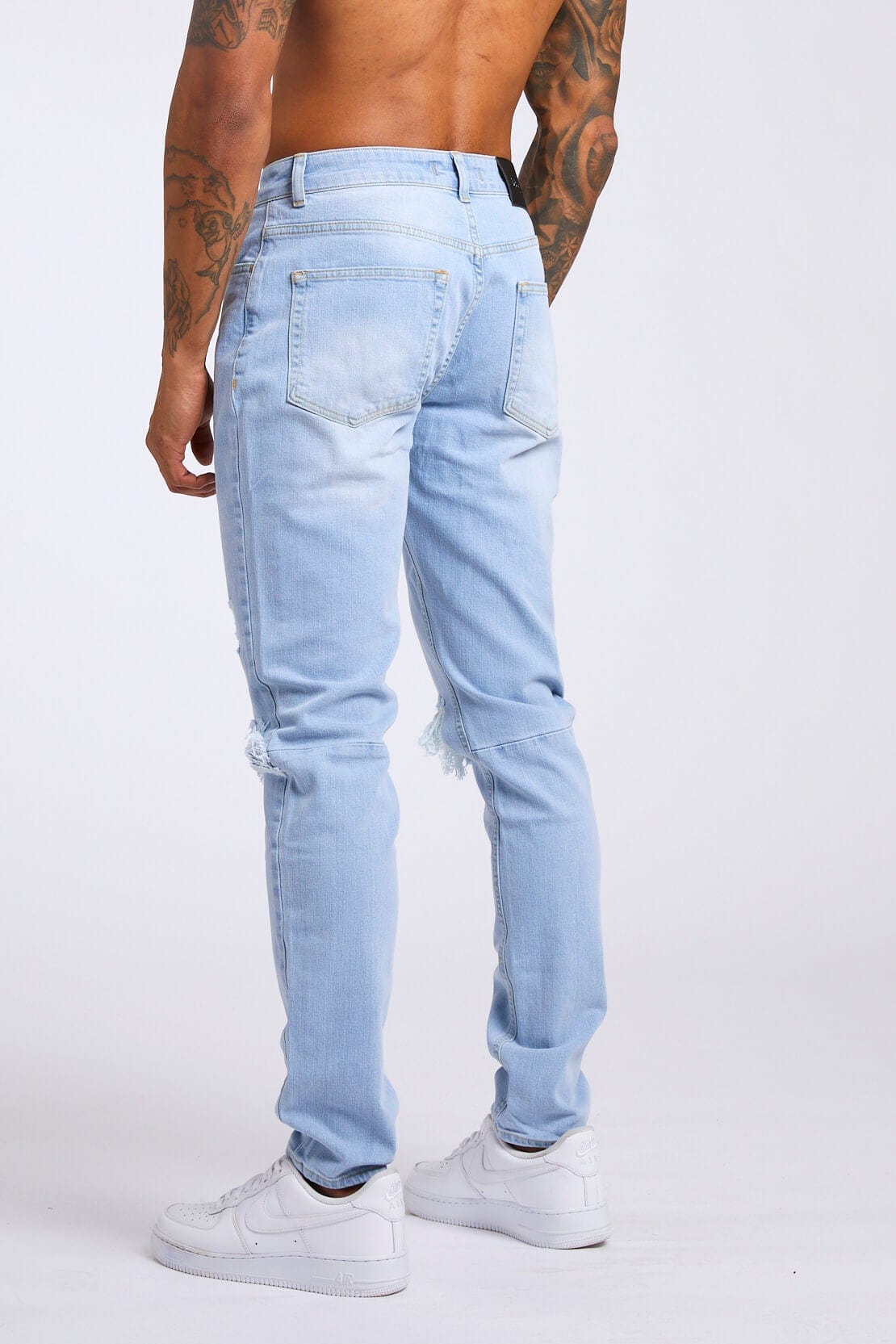 SLIM FIT JEANS 1.0 - LIGHT BLUE WASH DESTROYED KNEE