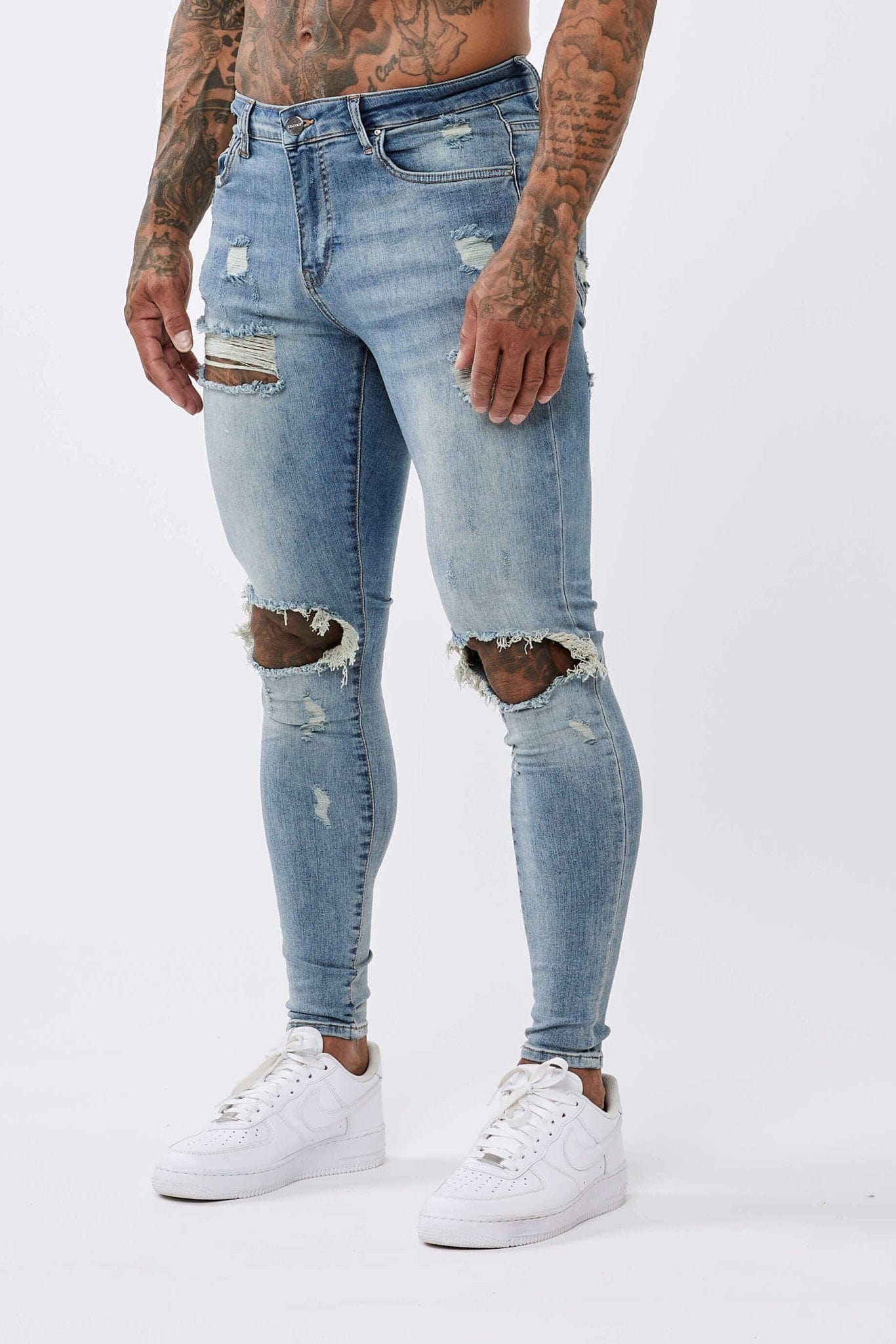 STRONG WASHED MID BLUE SPRAY ON JEANS - RIPPED & REPAIRED