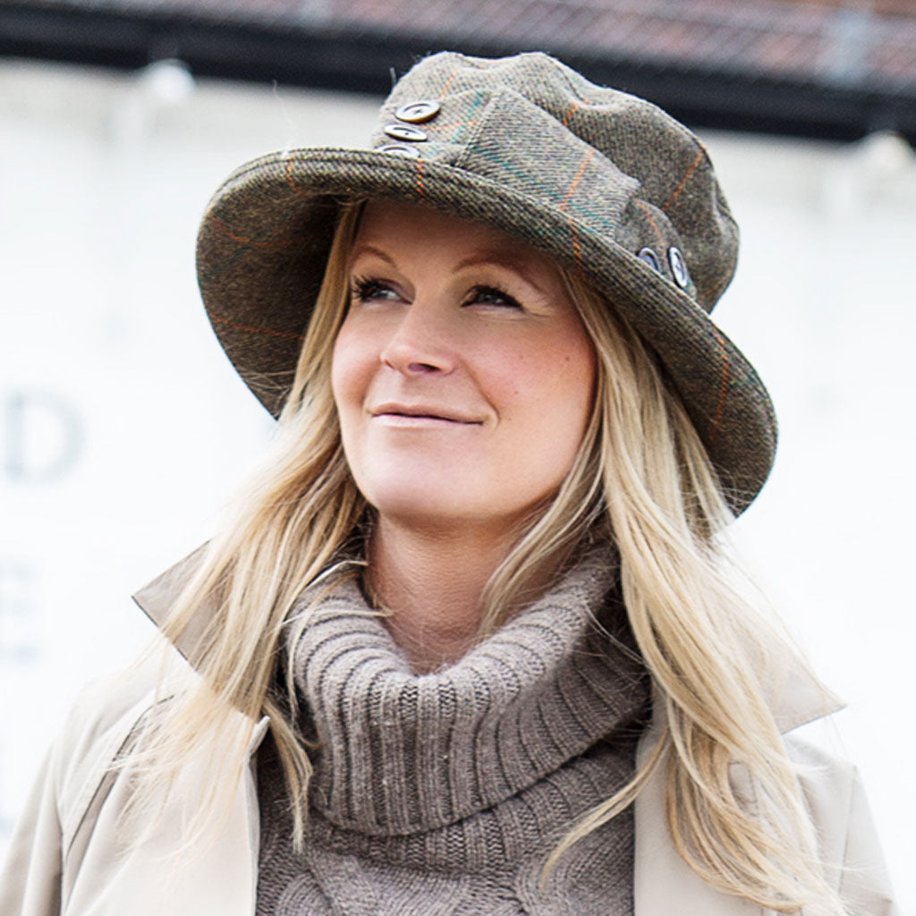 Ladies tweed rain hat with bow on the side