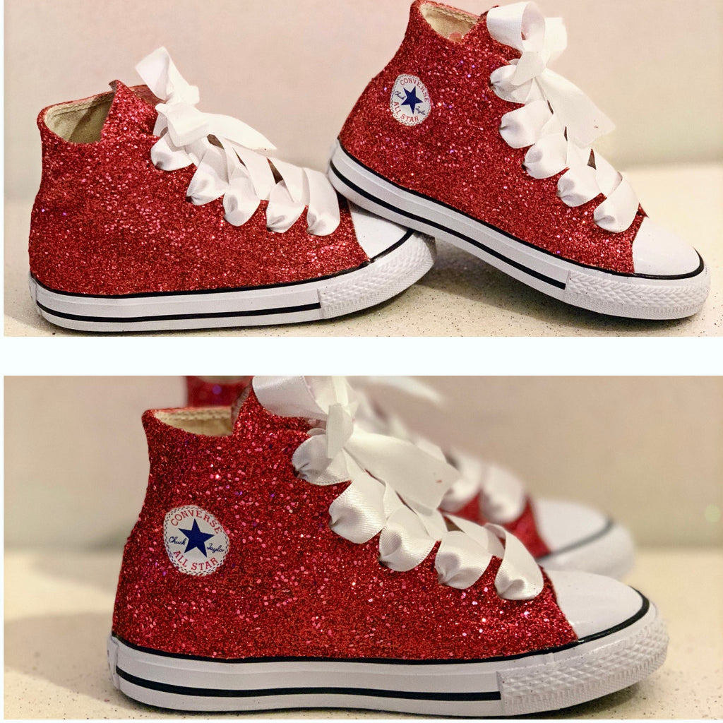 red sparkly converse high tops