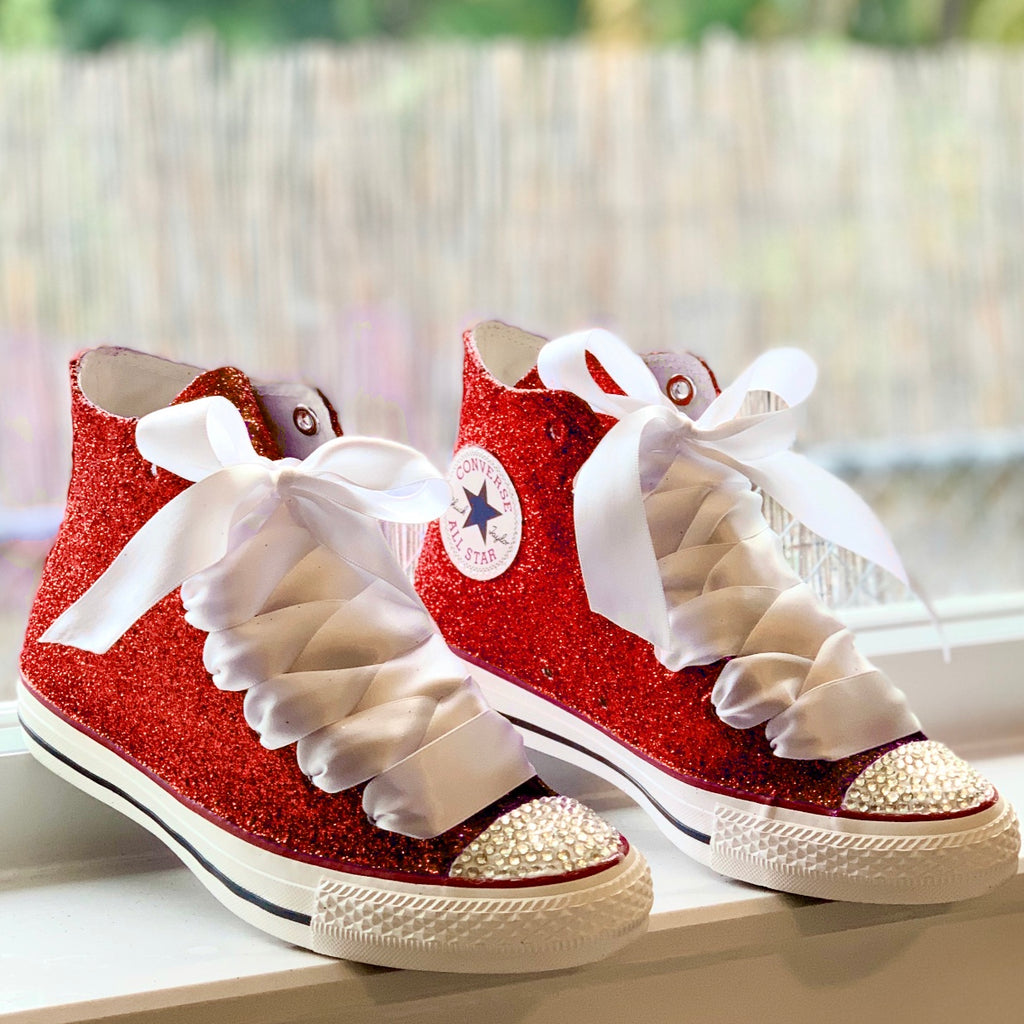 red sparkly converse high tops