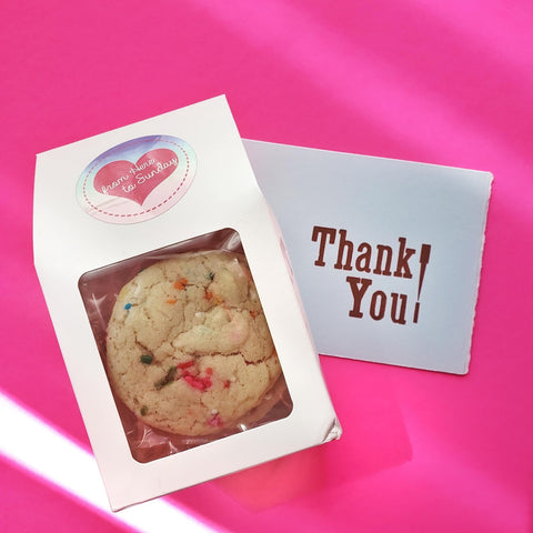 box of cookies with thank you note