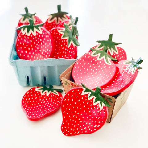 Strawberry dishes in a crate