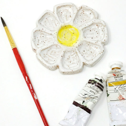 daisy palette by SMO ceramics with paintbrush and paints