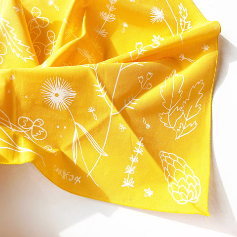 lightly crumpled yellow bandana with white wildflower print by sarofox