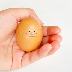 egg lighter in palm