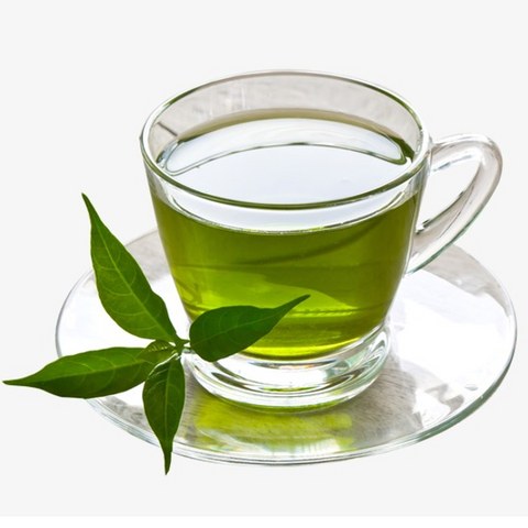 A cup of green tea with a leave decor