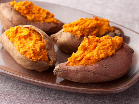 a plate of baked sweet potatoes