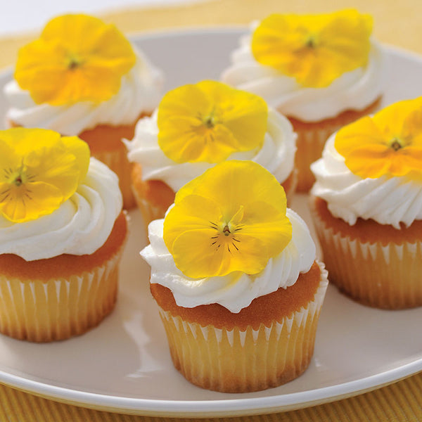 Edible flowers on cupcakes