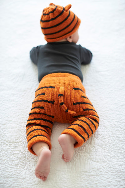 Knitted Animal tiger trousers and beanie on a baby