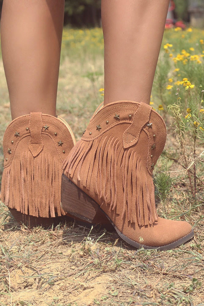 very volatile fringe boots