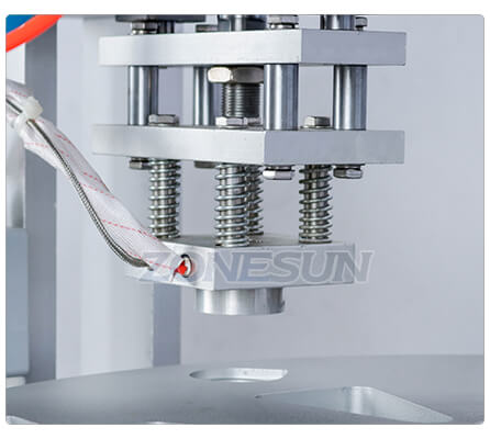 Estrutura de vedação da máquina de vedação de preenchimento de copo de iogurte ZS-FS100