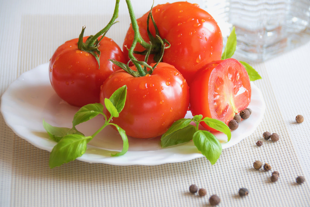 Roma tomatoes on a plate