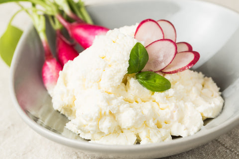 Tvarog buttermilk cheese served with baby radishes