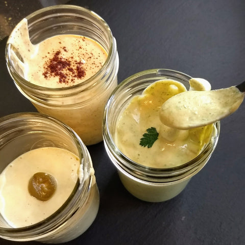 photo of three jars of vegan paleo sassy sauce, cheese sauce, DIY copycat bitchin sauce by Urban Cheesecraft