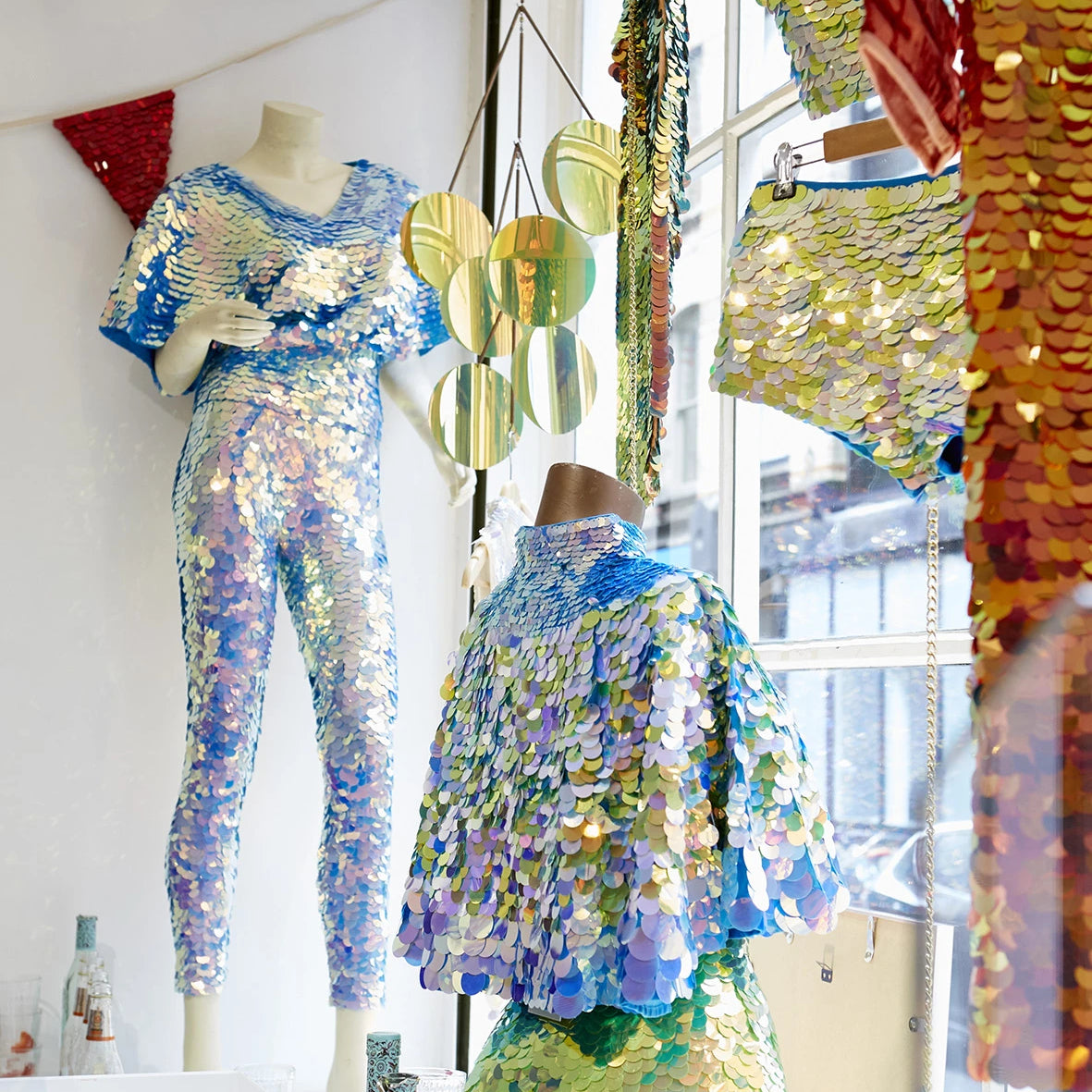 Sequin clothing display in a shop window