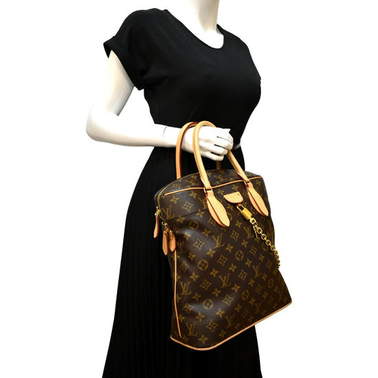 Carry all cloth handbag Louis Vuitton Brown in Cloth - 32570921