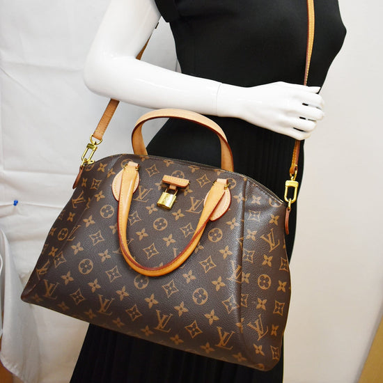 Louis Vuitton Monogram Rivoli Briefcase Bag. Made in France. DC: MI1927