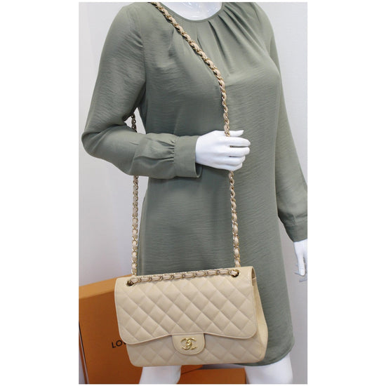 Timeless Chanel Beige Quilted Caviar Jumbo Classic Double Flap Bag Leather  ref.932275 - Joli Closet