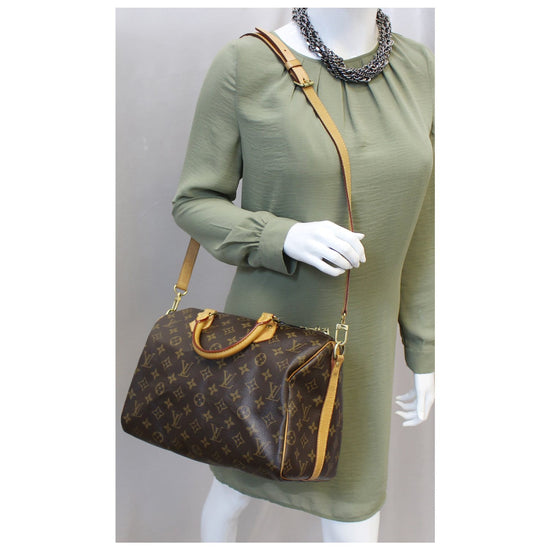 Speedy bandoulière leather handbag Louis Vuitton Green in Leather