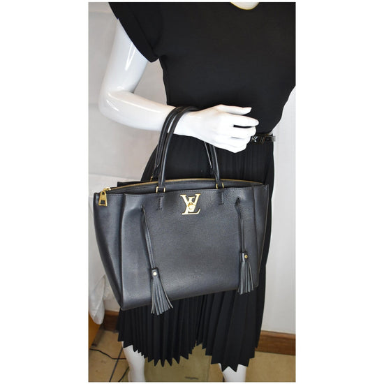 LOUIS VUITTON Lockmeto Brown Caramel Black and White Leather Tassel Tote Bag