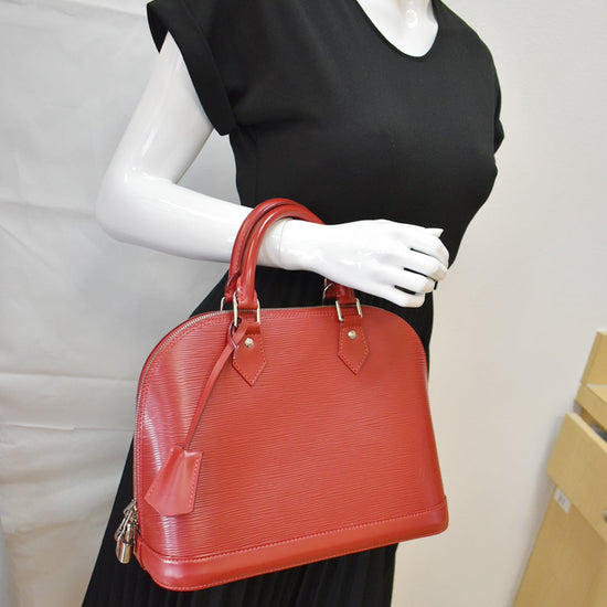 Louis Vuitton Red Epi Alma PM with Strap at Jill's Consignment