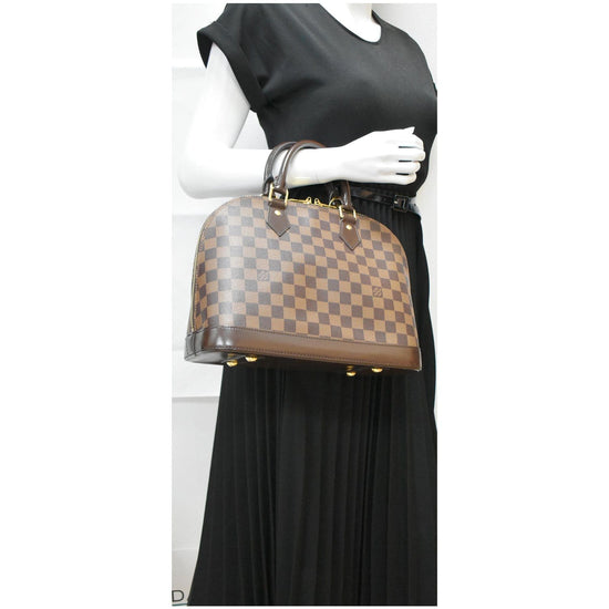 Louis Vuitton Brown Damier Ebene Alma PM Cloth ref.968943 - Joli Closet