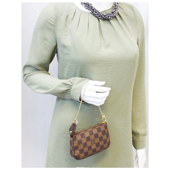 Louis Vuitton // Brown Damier Ebene Mini Pochette Accessoires Bag – VSP  Consignment