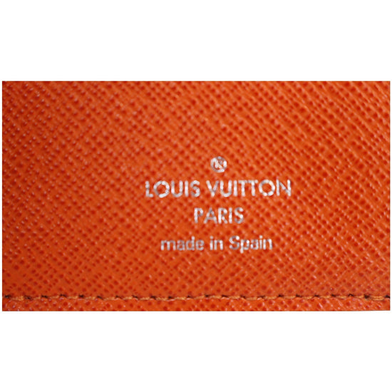 Louis Vuitton Marie-Lou Wallet, the brown monogram coated canvas and orange  epi leather with silver button snap, opening to one card holder, one coin  sold at auction on 3rd December