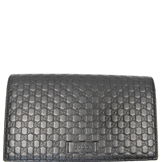 Gucci Logo Print Leather Crossbody Bag in Black –