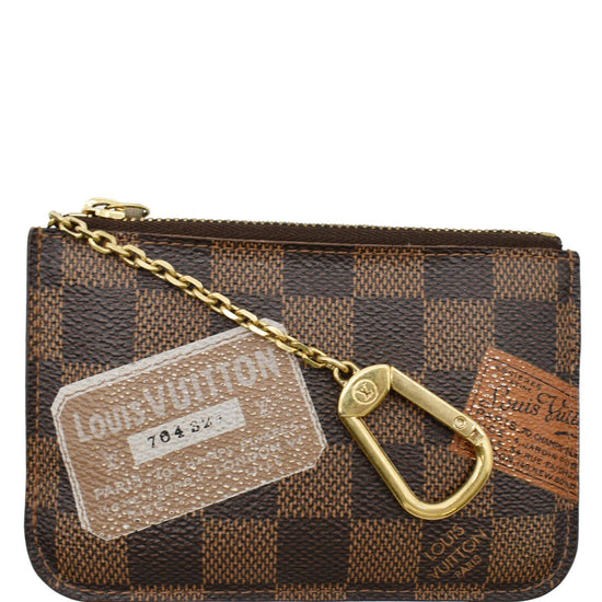 Key pouch leather handbag Louis Vuitton Brown in Leather - 25499040