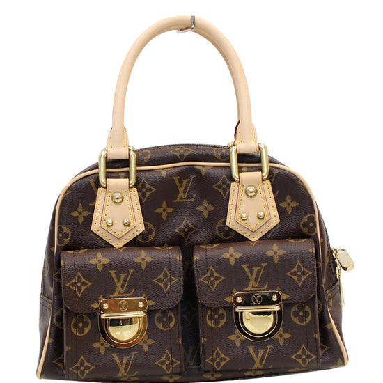 A Louis Vuitton monogram canvas Manhattan PM bag, the front with two  compartments with brass monogrammed