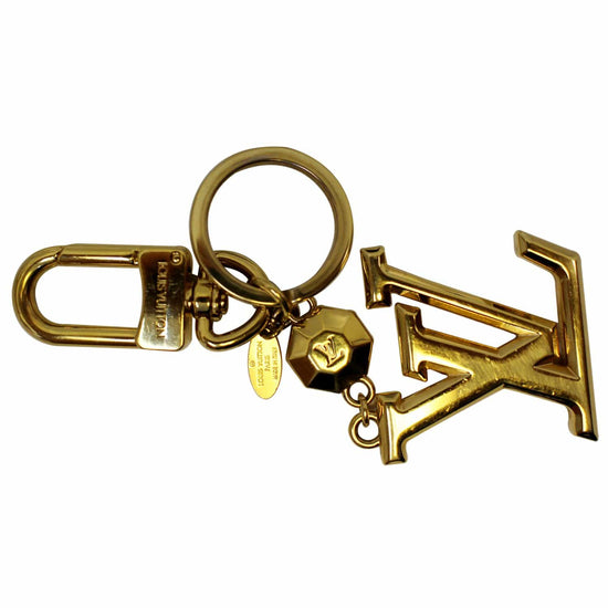 LOUIS VUITTON LV Facettes Bag Charm Key Holder Gold | FASHIONPHILE