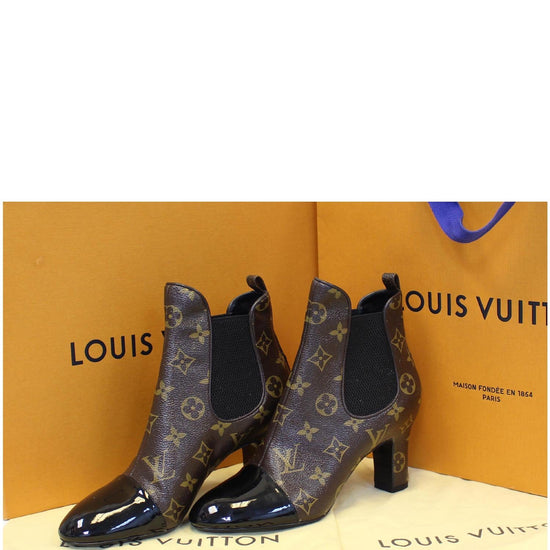 Louis Vuitton boots in red and black patent Monogram canvas