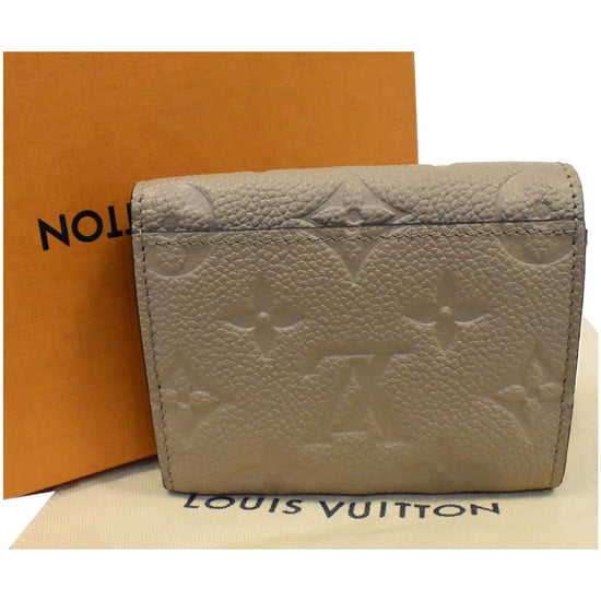 Louis Vuitton Womens Tourterelle Never Full Pochette Empreinte Leather MM  Cream ref.1005683 - Joli Closet
