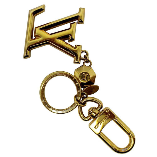 LOUIS VUITTON: Gold/Brass, Metal "LV" Logo Padlock &