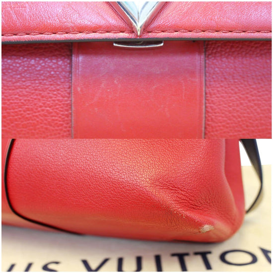 Louis Vuitton Rubis Epi Leather Montaigne Clutch Auction