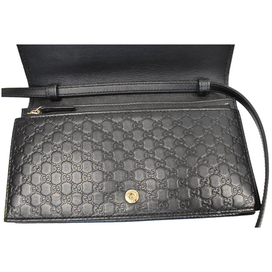 Gucci Logo Print Leather Crossbody Bag in Black –