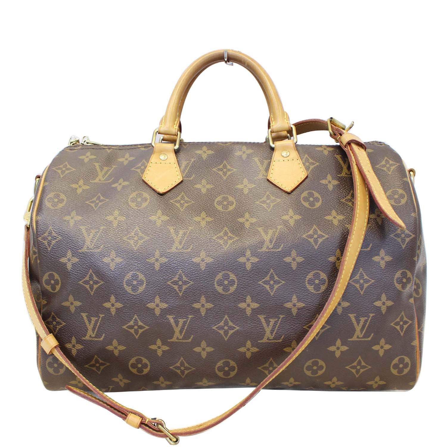 Louis VUITTON Speedy 35 travel bag in monogram coated c…