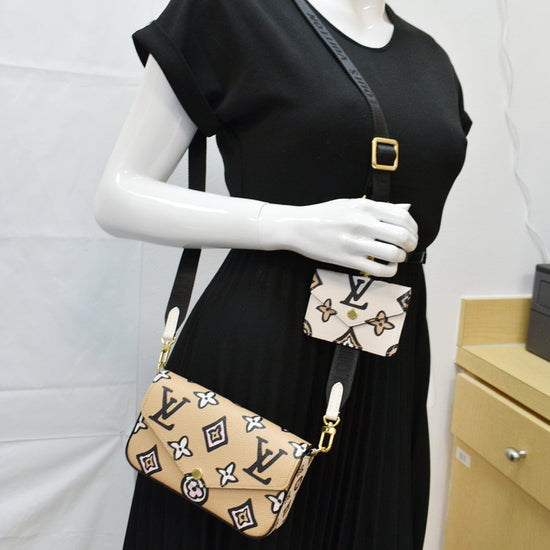 Félicie strap & go cloth crossbody bag Louis Vuitton Black in