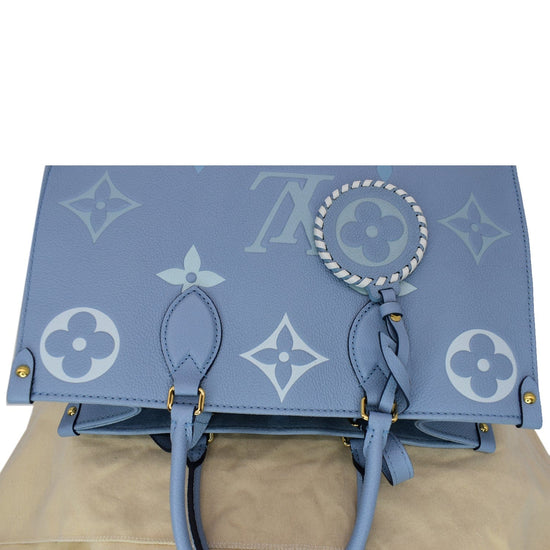 LOUIS VUITTON Empreinte Monogram Giant By The Pool Onthego MM Summer Blue |  FASHIONPHILE