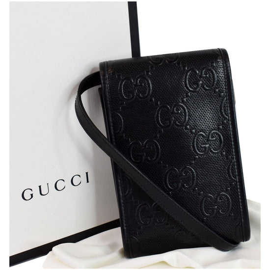 Gucci GG Embossed Leather Messenger Bag in Black for Men