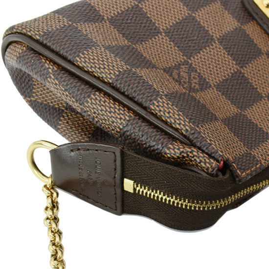 Eva cloth clutch bag Louis Vuitton Brown in Cloth - 29859898