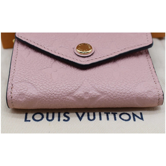 Authentic Louis Vuitton Pink Monogram Empreinte Leather Zoe Wallet – Paris  Station Shop