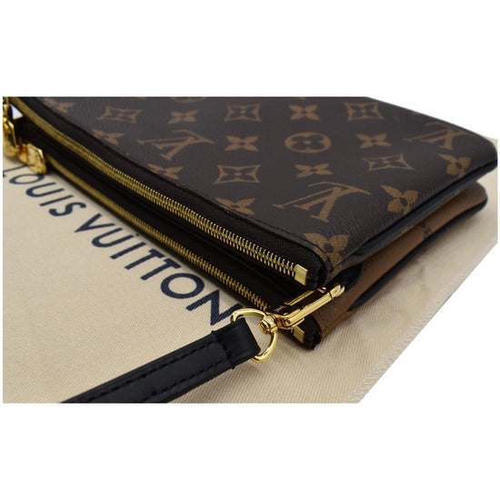Louis Vuitton® Double Zip Pochette Monogram Monogram Reverse. Size in 2023